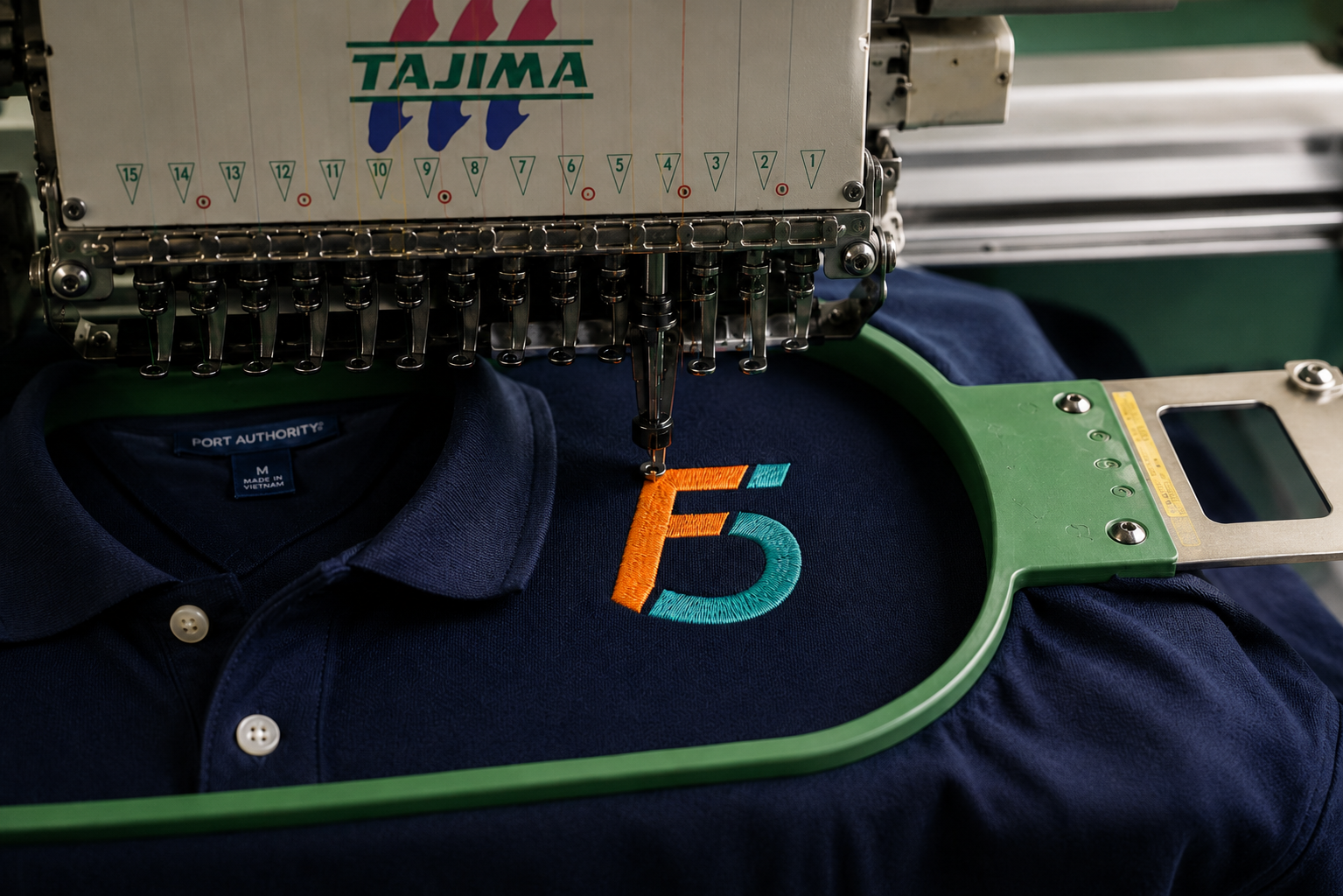 Embroidered left-chest logo detail on a polo — embroidery services Columbia SC